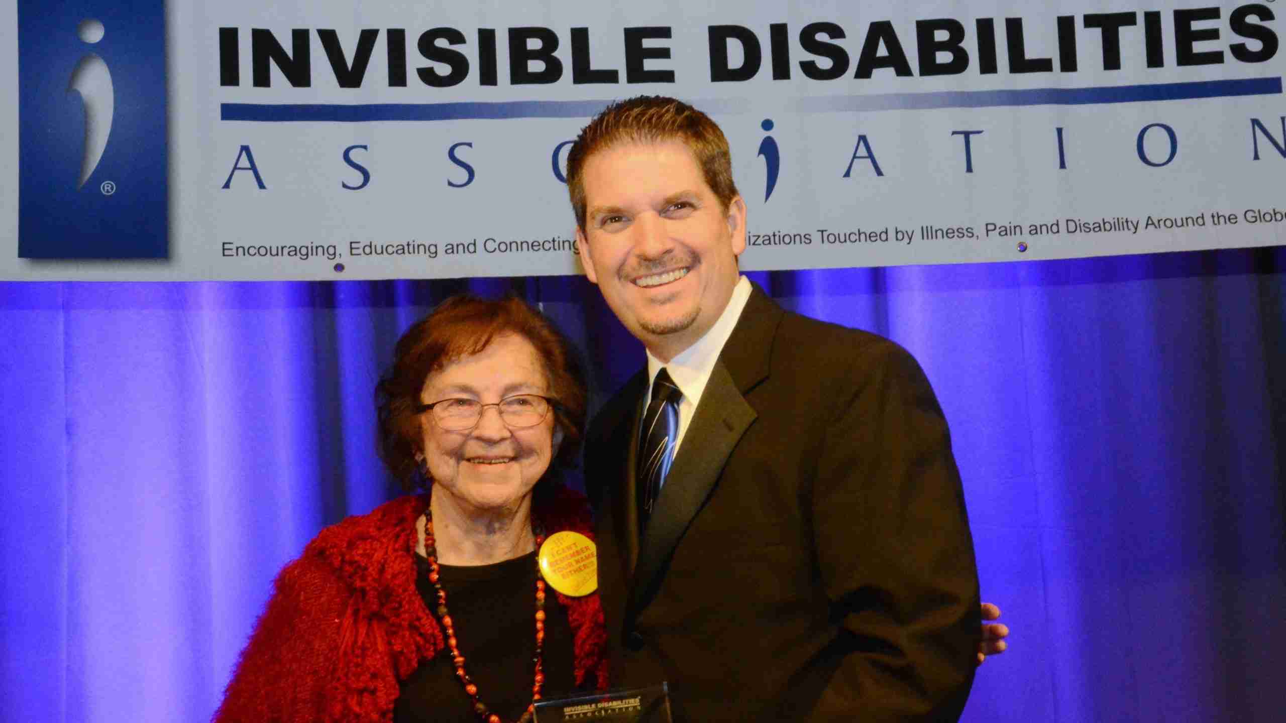 LaFawn Biddle - Hearing is Believing Award and Wayne Connell - Invisible Disabilities Association